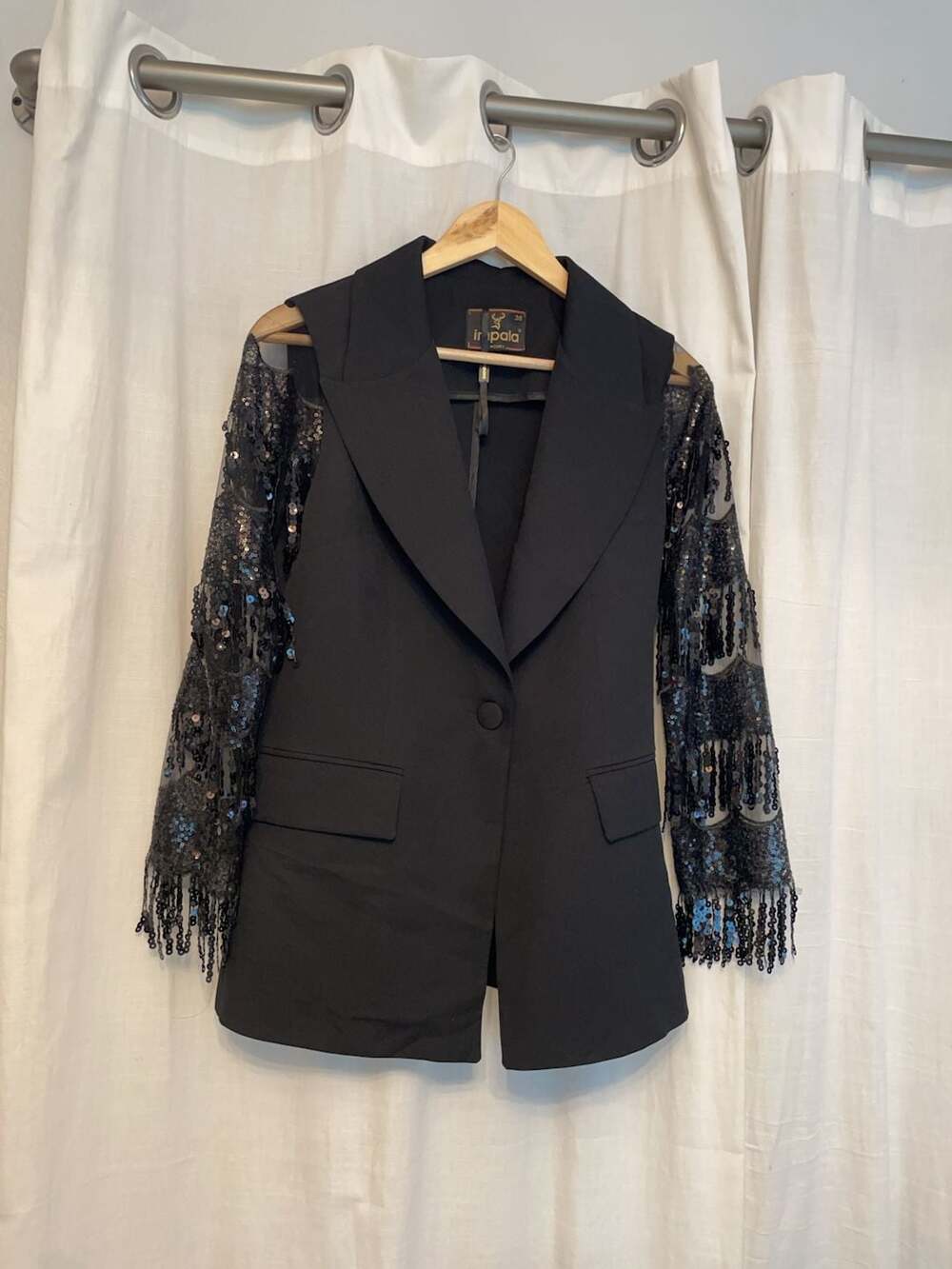 Impala Women's Black Blazer with Sequin Fringe Sleeves Size 38
Dinner party